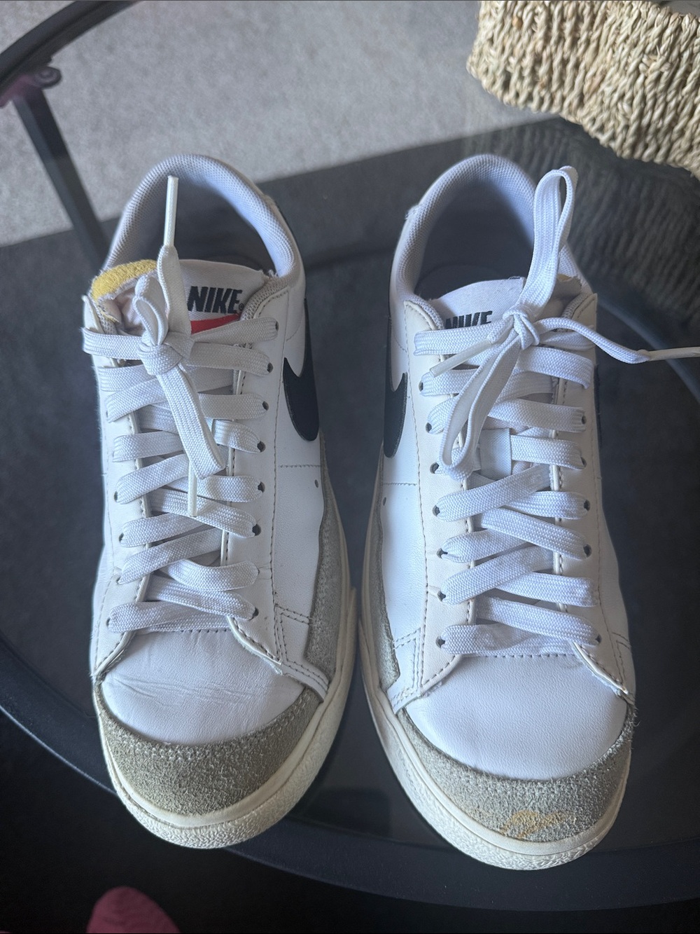 Nike Menās White Sneakers with Black Swoosh and Gray Suede Toe